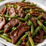 garlic beef with green beans on the blackstone gri 2026 05 30 213124 817x1024 1
